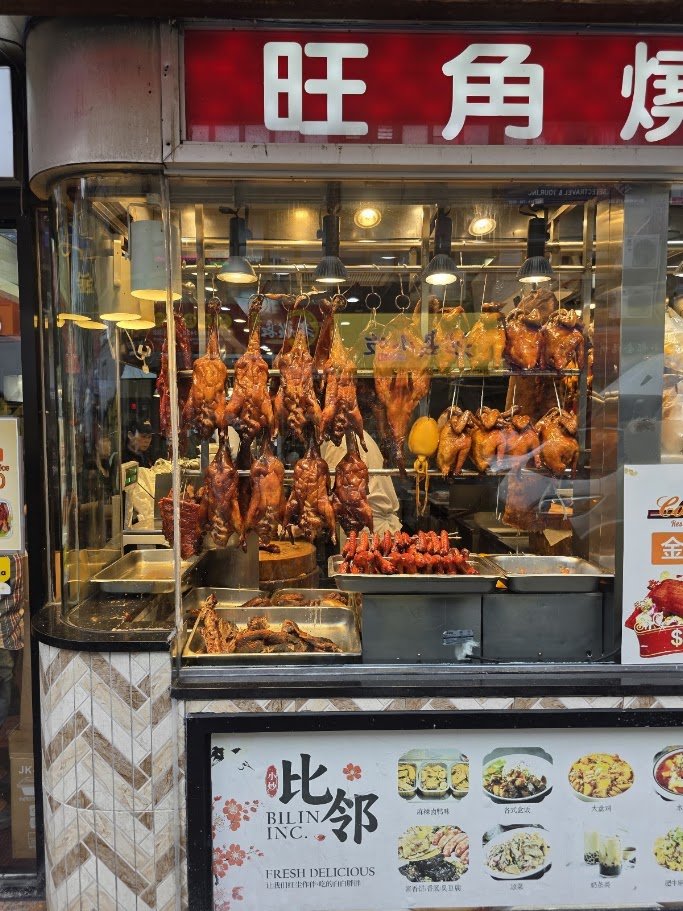 Plates of duck and barbecue pork.
